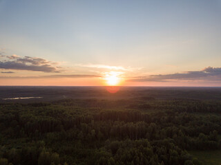 Obraz premium countryside fields and forests in sunset