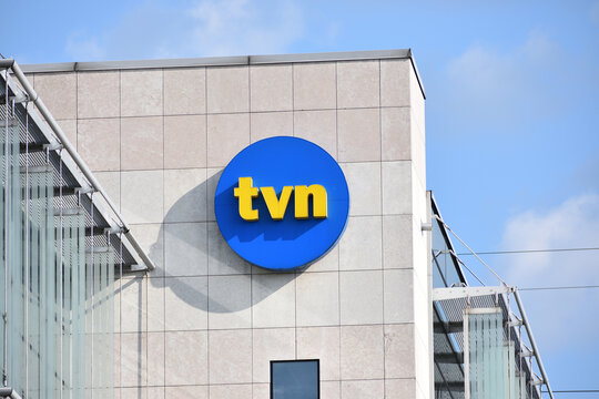 TVN Polish TV channel signage, symbol, emblem on the facade of the Polish TV station, owned by TVN Group. WARSAW, POLAND - AUGUST 21, 2021