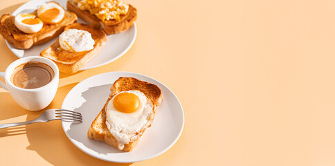 fried Toast bread with four different types of cooked chicken eggs, scrambled eggs, fried eggs, poached egg and creamed egg. Breakfast of chicken eggs. methods of making eggs for breakfast