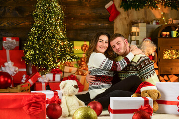 man and woman happy at xmas. holiday gifts for beloved. spend new year together. couple in love among present box. celebrate xmas party with your couple. last holiday preparations