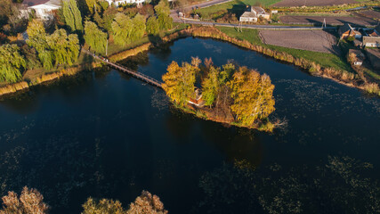 Fishermans House in autumn, vertical aerial view, Staryi Solotvyn, Ukraine