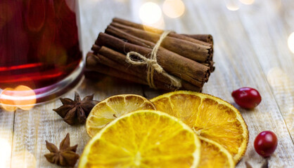 glasses with mulled wine on a wooden background. new year concept
