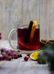 glasses with mulled wine on a wooden background. new year concept