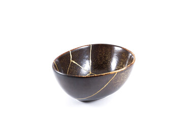 Antique Japanese Kintsugi, brown black Kintsugi bowl restored with gold cracks.