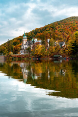 autumn at Hamori lake in Miskolc Lillafured with the palace castle and reflection