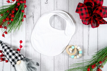 Baby bib product mockup. Christmas farmhouse theme SVG craft product mockup styled with gift with...