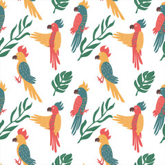 Obraz premium Exotic parrots seamless pattern. Tropical birds background. Isolated vector illustration.