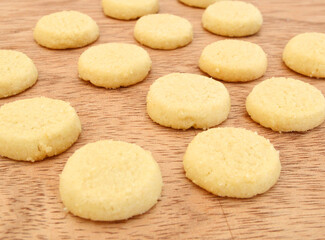 Fototapeta na wymiar Freshly baked sugar cookies on wooden board