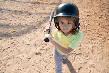 Child playing Baseball. Batter in youth league getting a hit. Boy kid hitting a baseball.