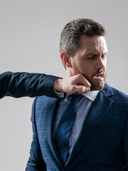 He can take a punch. Businessman got punch in chin. Physical fighting. Workplace violence