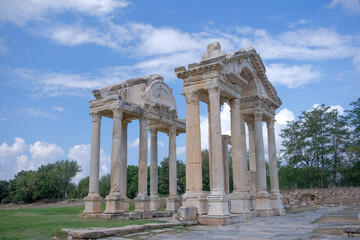 Fototapeta premium Afrodisias (Aphrodisias) Ancient city in Karacasu - Aydin, Turkey. Tetrapylon Gate of Aphrodisias ancient city. The most famous of cities called Aphrodisias.