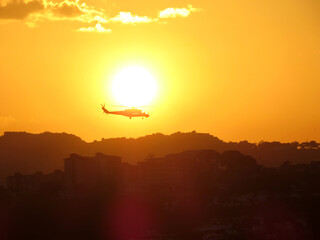 Mil Mi-35M2 35 in the sunset over the city