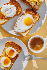 fried Toast bread with four different types of cooked chicken eggs, scrambled eggs, fried eggs, poached egg and creamed egg. Breakfast of chicken eggs.
