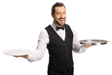 Smiling male server holding plates and a tray