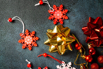 Christmas background. Christmas decorations on dark background. Top view with copy space. New Year flatly. Christmas flatly with decor. New Year composition
