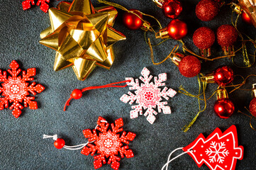 Christmas background. Christmas decorations on dark background. Top view with copy space. New Year flatly. Christmas flatly with decor. New Year composition