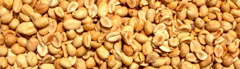 long horizontal view of fresh organic shelled peanuts nuts