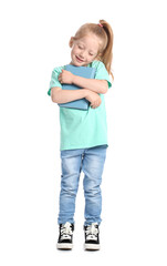 Funny little girl hugging book on white background