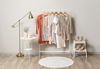 Interior of stylish room with clothes
