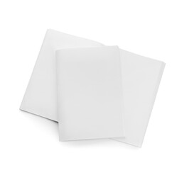 Blank magazines on white background, top view