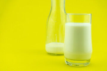 Banner of a glass of milk on colorful background Milk day Copy space © Panya