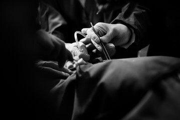 Obraz na płótnie Canvas Doctors doing an operation