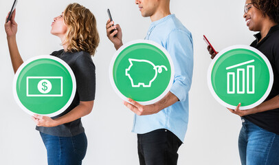 Diverse people holding financial icons