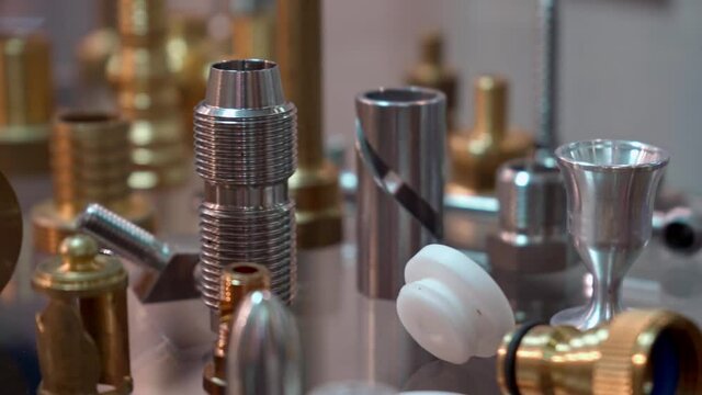 A variety of metal industrial products and components made of various alloys.
