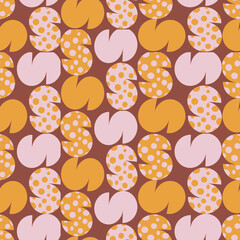 Brown with pink and yellow S shape elements with dots seamless pattern background design.