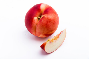 Fototapeta na wymiar Peach on a white background