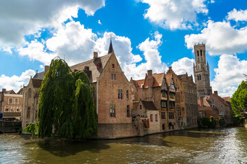 Canal in Bruges and Belfry tower