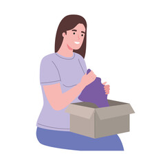 woman opening box with clothes