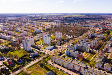 Fototapeta premium Aerial view of modern residential areas of Polish city of Leszno in sunny spring day