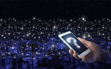 FAQ frequently asked questions concept. Hand hold white smartphone with digital hologram question mark sign on city dark blurred background.
