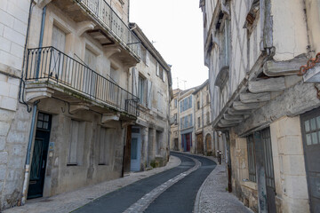 Fototapeta na wymiar Narrow street in old franche city Niort, in the Deux-Sèvres department in western France.
