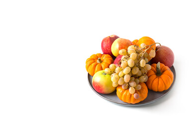 Vegetables and fruits on a table. Healthy food, autumn harvest. Copy space.