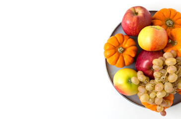 Vegetables and fruits on a table. Healthy food, autumn harvest. Copy space.