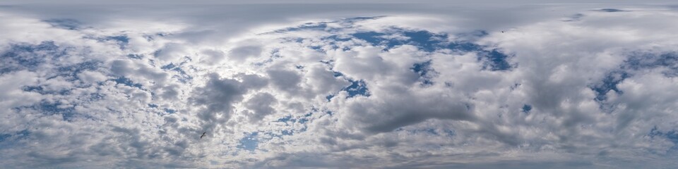 Blue sky panorama with Cumulus clouds. Seamless hdr 360 degree pano in spherical equirectangular format. Complete zenith for 3D visualization, game and sky replacement for aerial drone 360 panoramas.