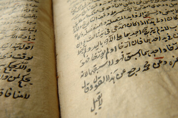 Ancient open book in arabic. Old arabic manuscripts and texts