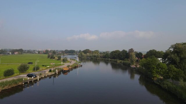 Aerial view of Amstelveen Oudekerk ad Amstel typical dutch landscape and historic village along the Amstel river in The Netherlands.
