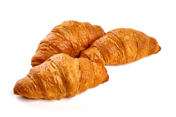 Freshly baked croissants, isolated on white background.
