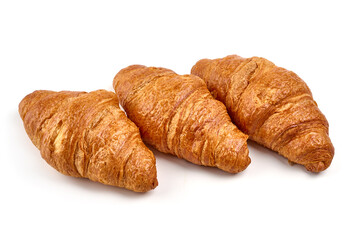 Freshly baked croissants, isolated on white background.