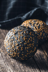 Black bun. Dark pastry with sesame seeds.