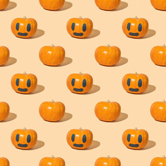 Seamless pattern with Halloween pumpkin on yellow background.