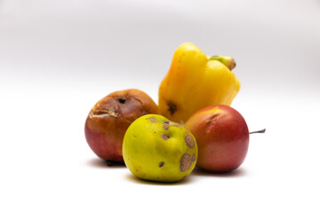 Spoiled food on the white table