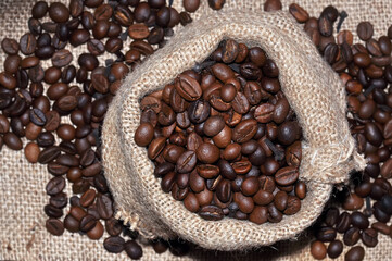 coffee beans on burlap background
