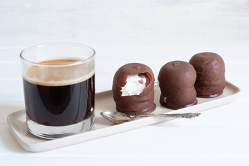 Chocolate covered marshmallow cookies. Israeli winter dessert. Krembo.