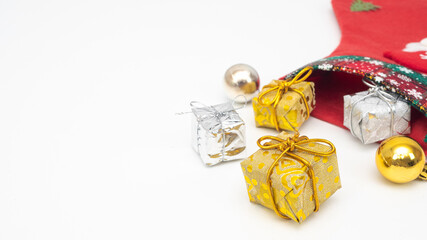 Close up christmas gift and accessories and stocking on white isolated copy space