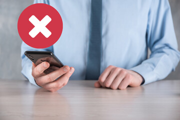 Hand holds icon,cancellation symbol,cancel icon.Cross mark flat red icon.round X mark.cancel...