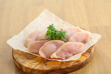 Raw chicken breast slices for cooking